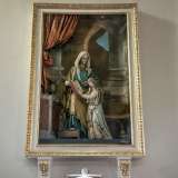 Sempre nella navata sinistra troviamo un altro altorilievo in cartapesta di Salvatore Bruno che mostra Sant�Anna guidare la piccola Maria nella lettura